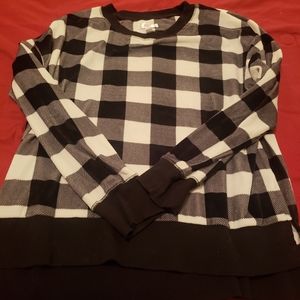Beautiful long sleeved black and white blouse